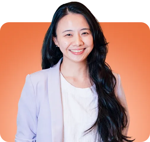 Samantha of Cupplets Creatives, smiling, on an orange ground
